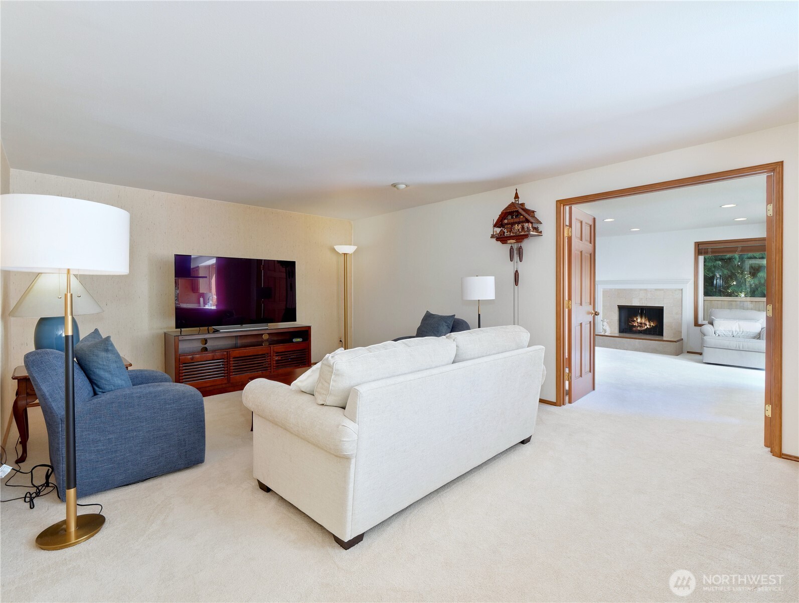 You go through a French door to a luxury room with a full bath and fireplace in it. There is 2nd door leads you to the backyard (not picture)