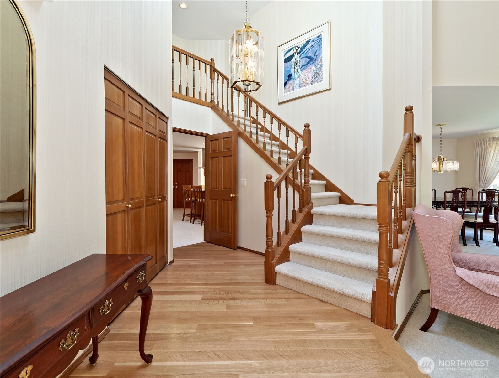 A beautiful foyer is inside at the front entrance with white Oak hardwood flooring.