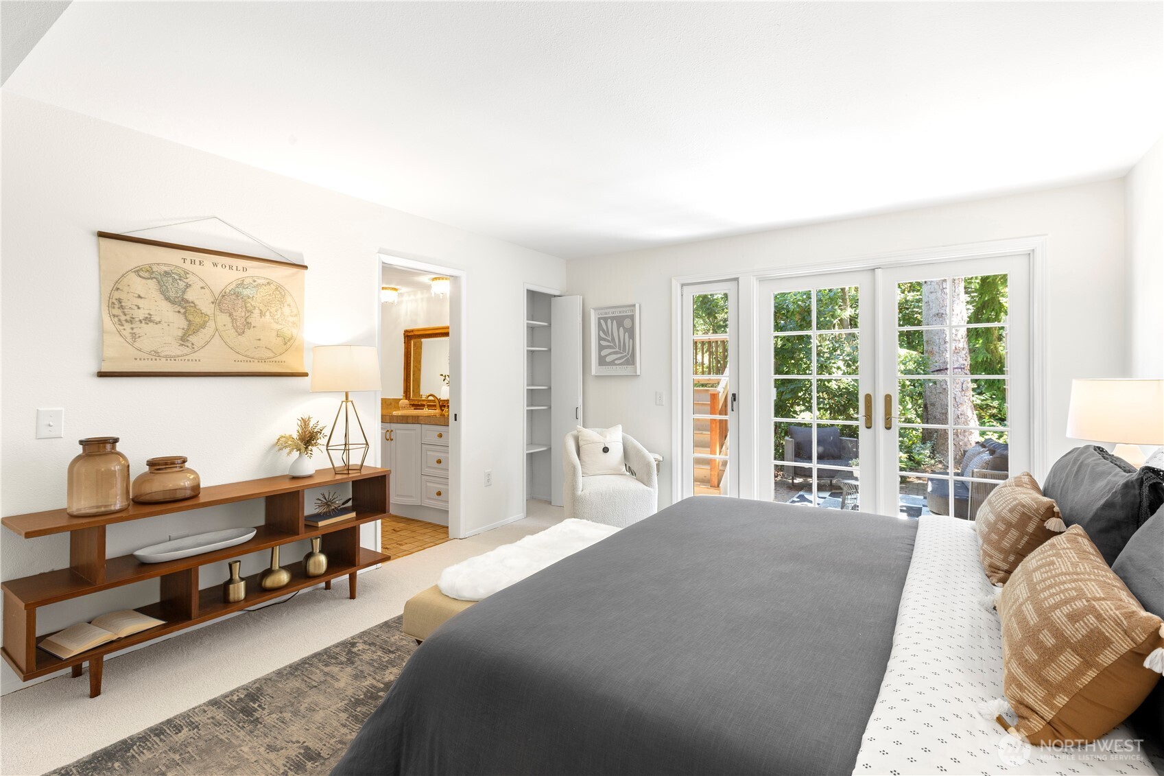 Primary bedroom opens to private patio!