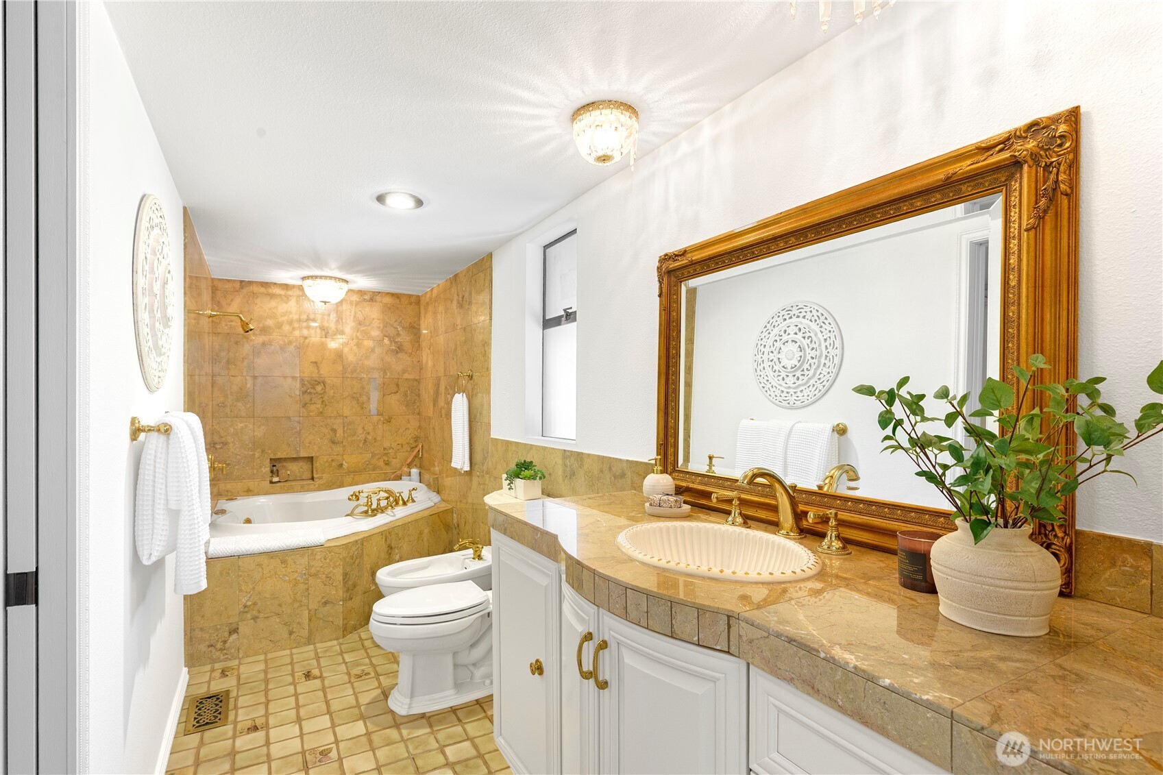 Elegant primary bath with luxurious soakin tub!