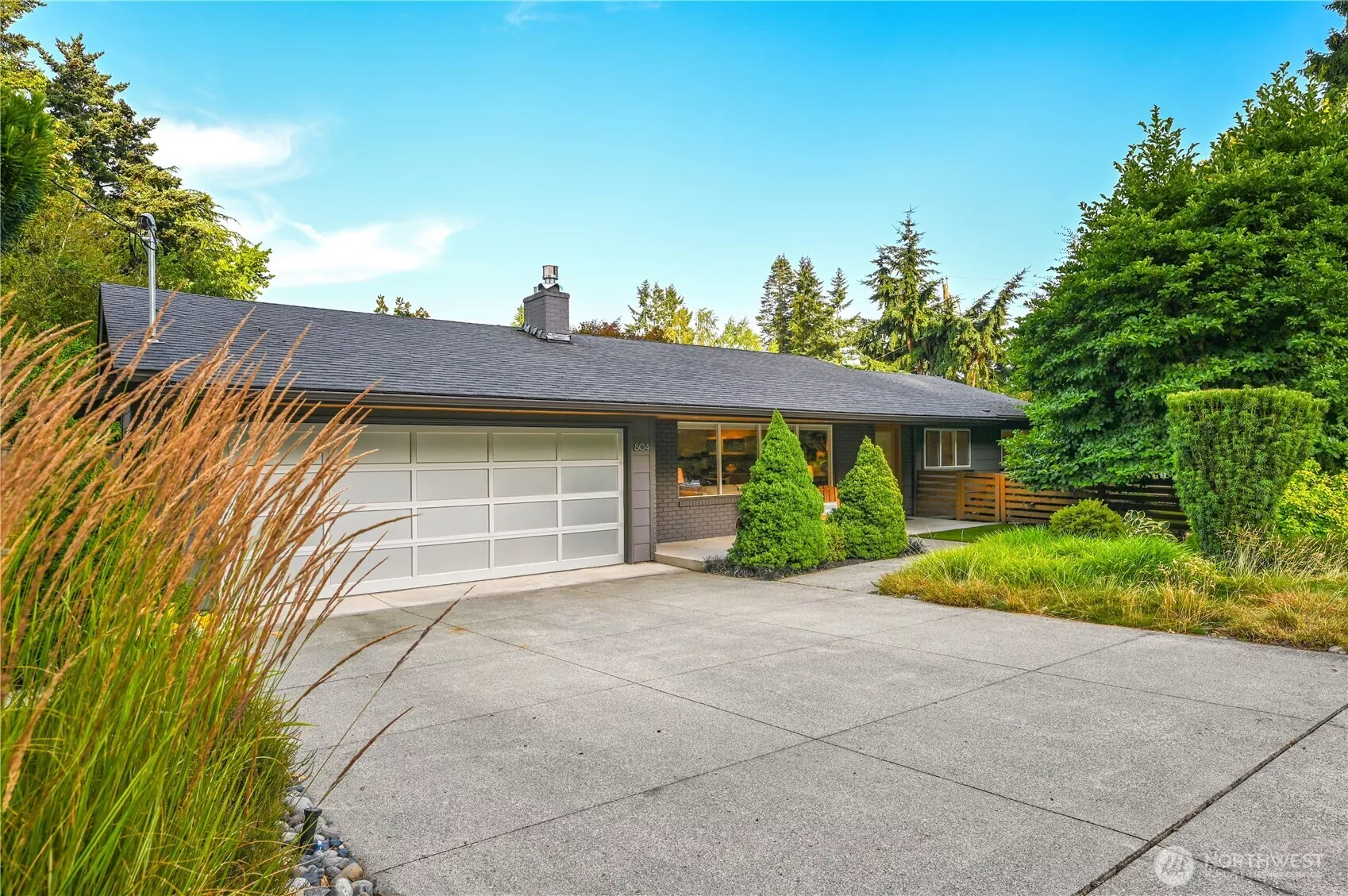 Beautifully updated one-level luxury home on a privately situated corner lot.