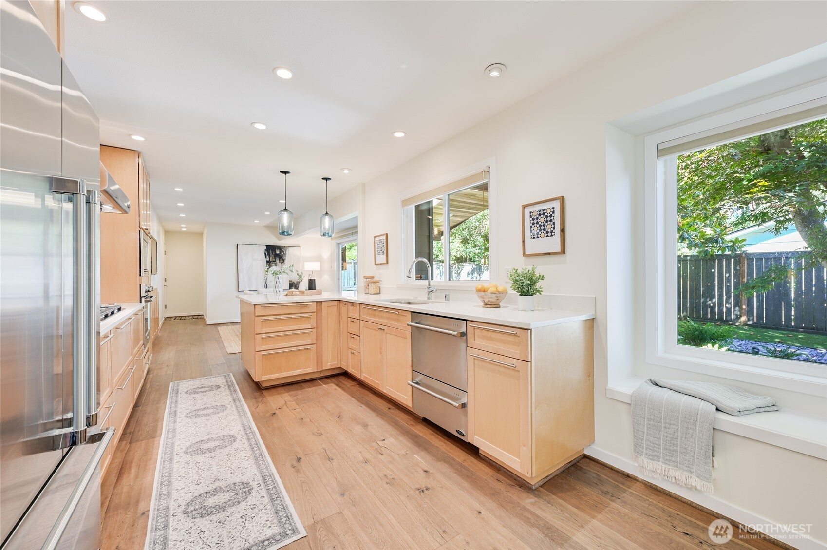 Another view of the stunning kitchen and window seat overlooking the lush gardens and grounds.