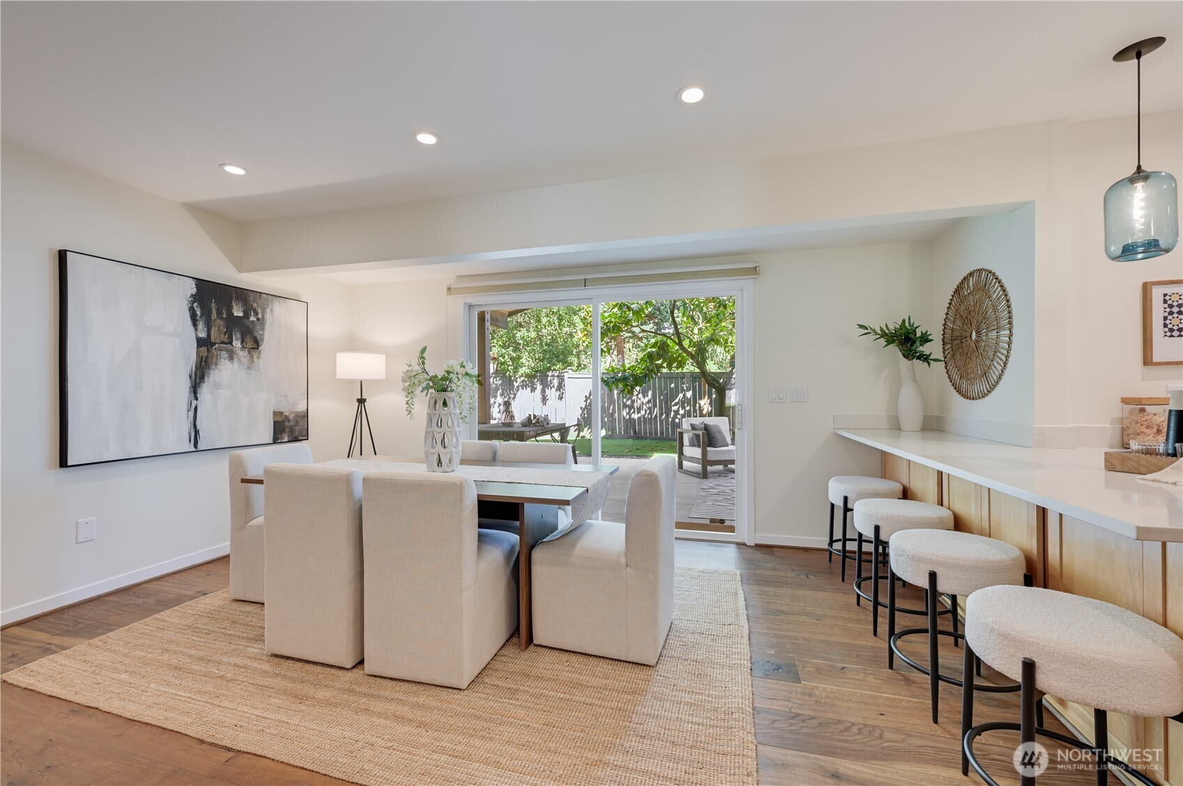 Cool bar seating for gatherings in the kitchen and dining area.