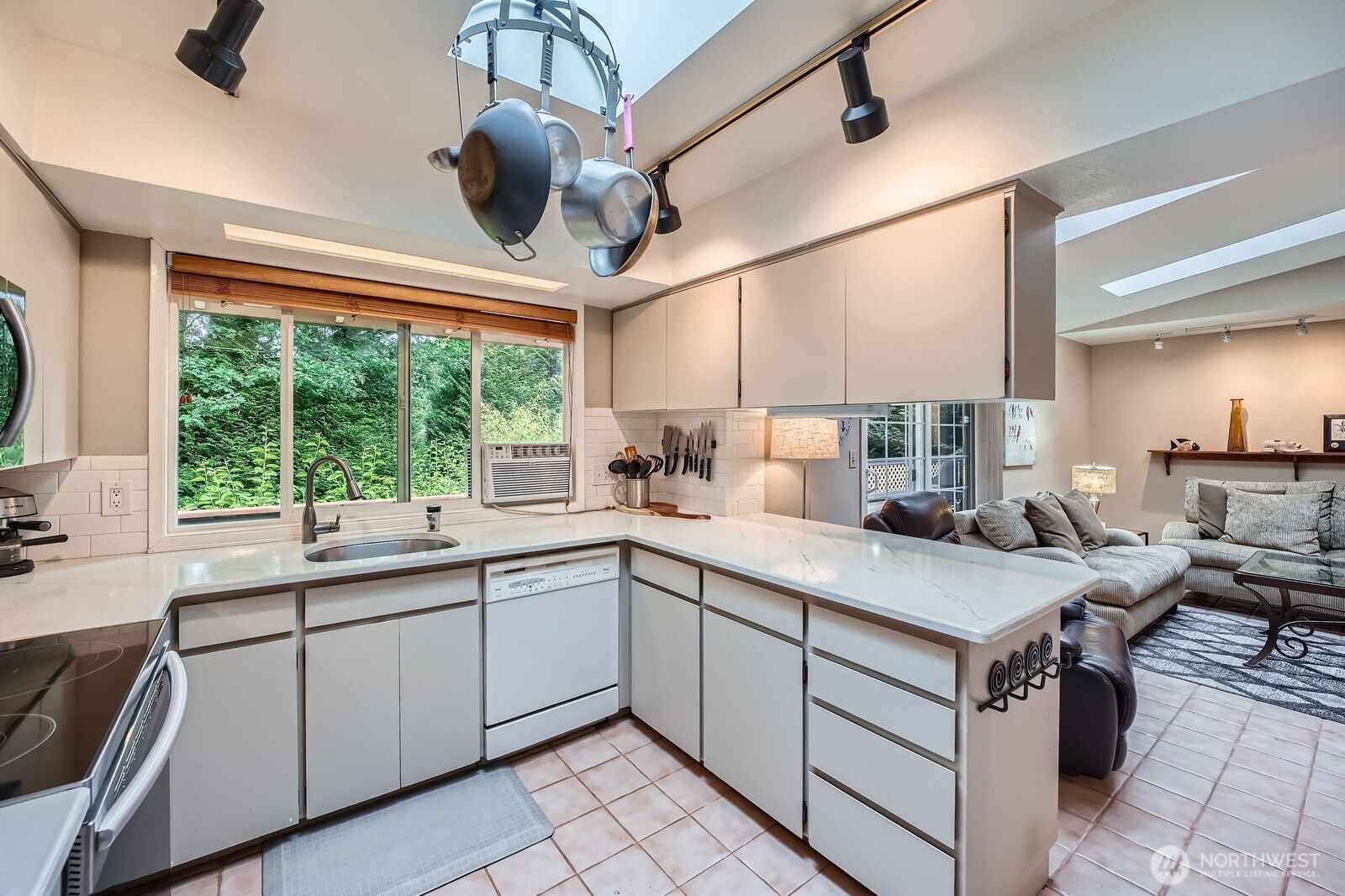 Main floor Kitchen with updated Quartz countertops.