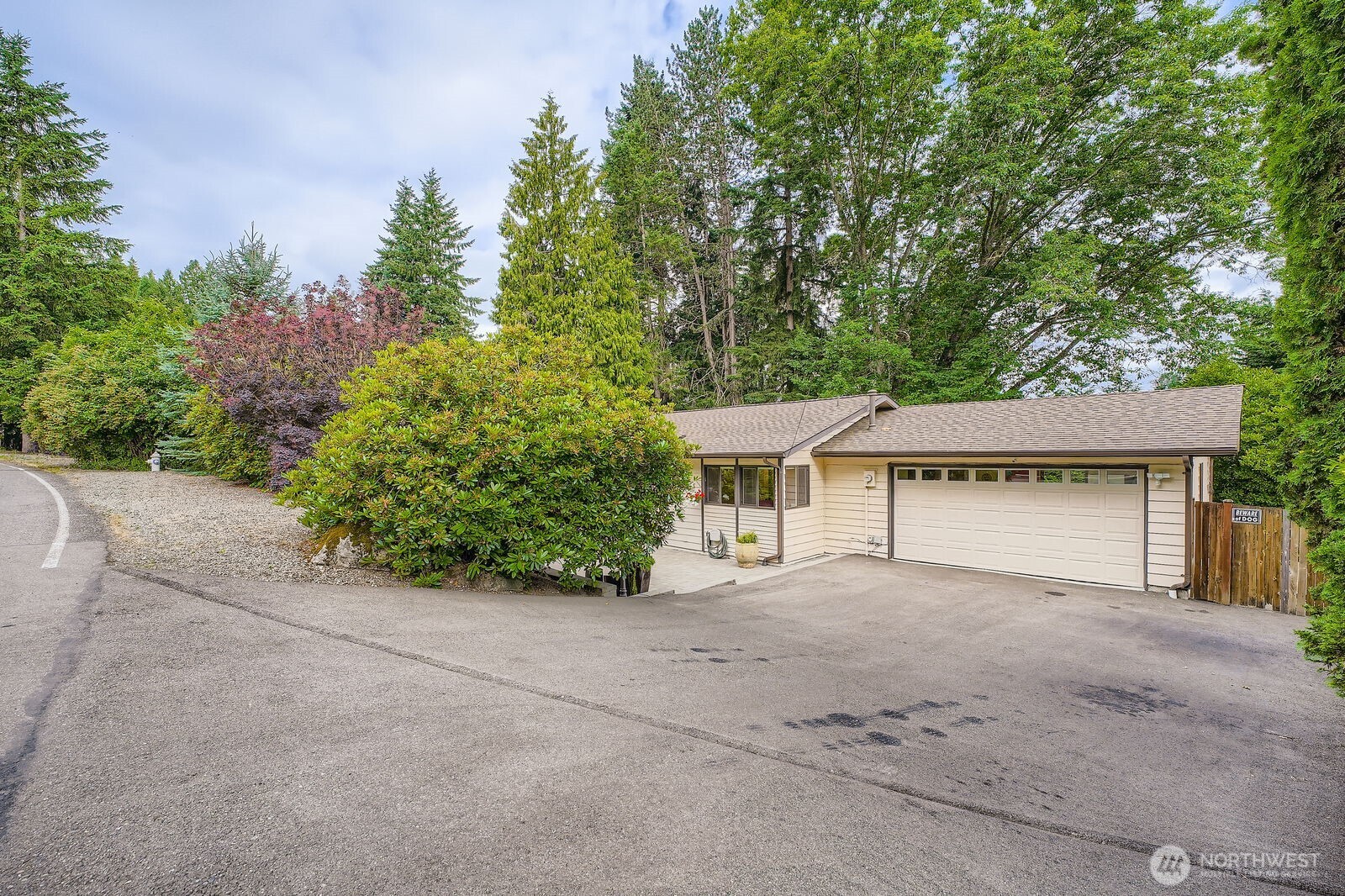 Driveway, Garage and upper guest Parking area.