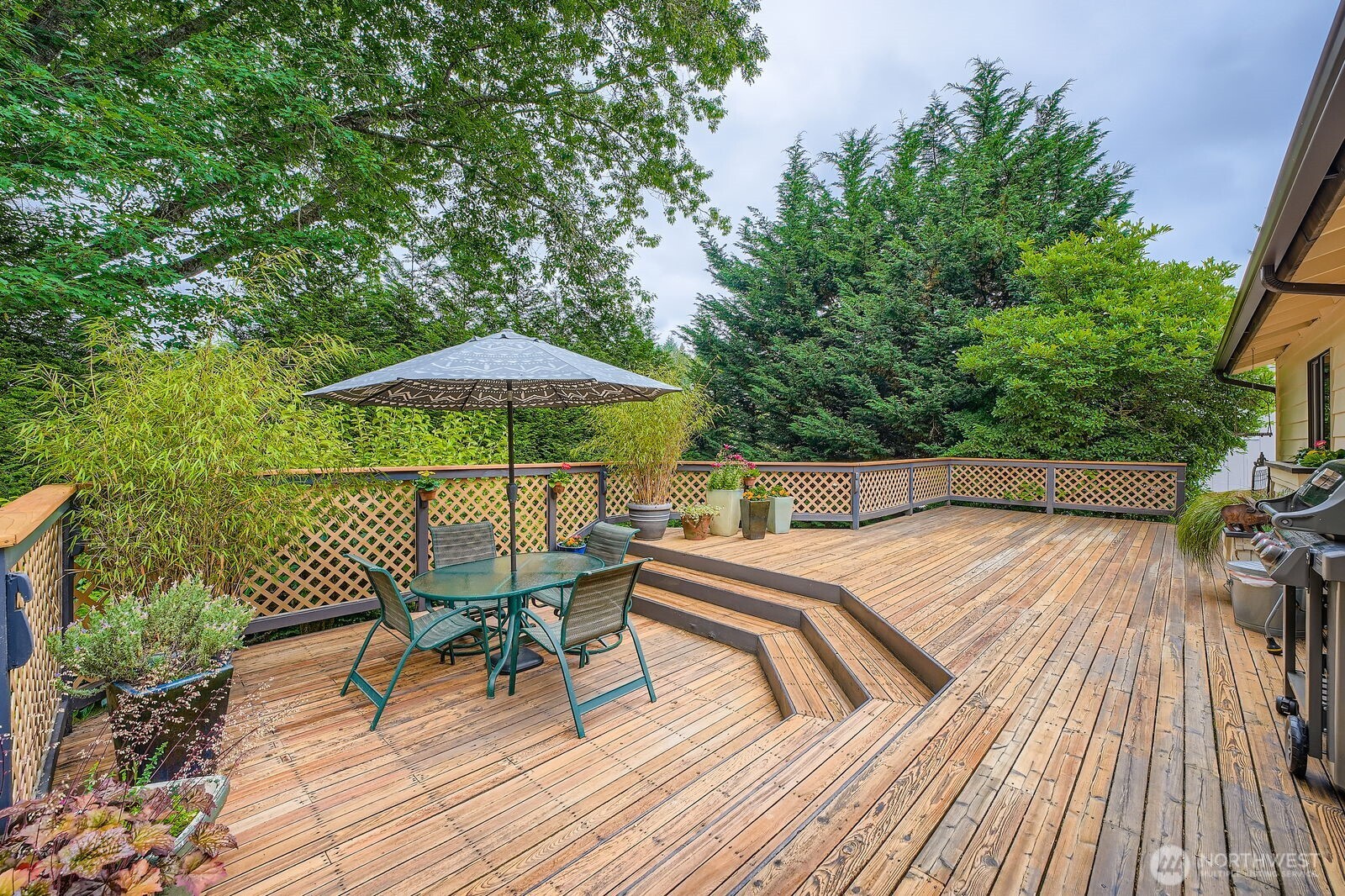 Main floor Custom Expansive, deck off Kitchen. Great for entertaining BBQ's and outdoor living space!