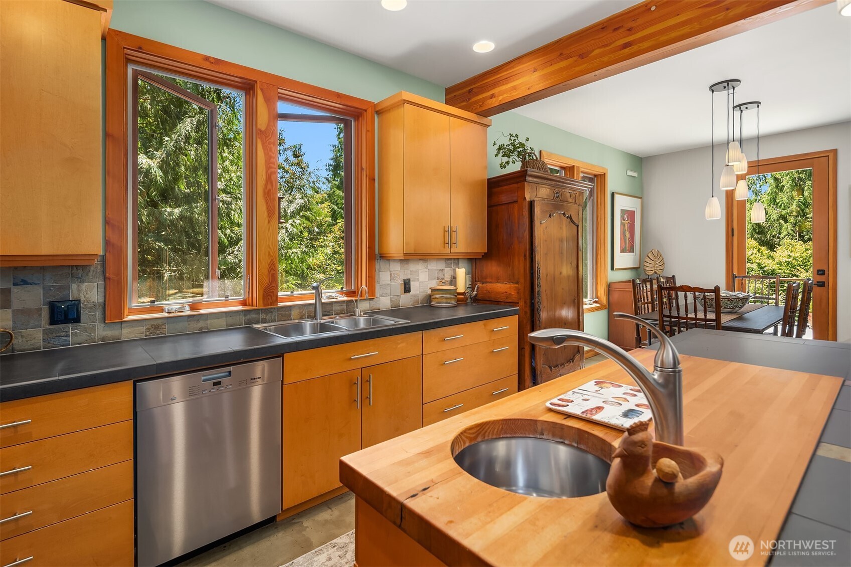 Center island with prep sink and cutting board