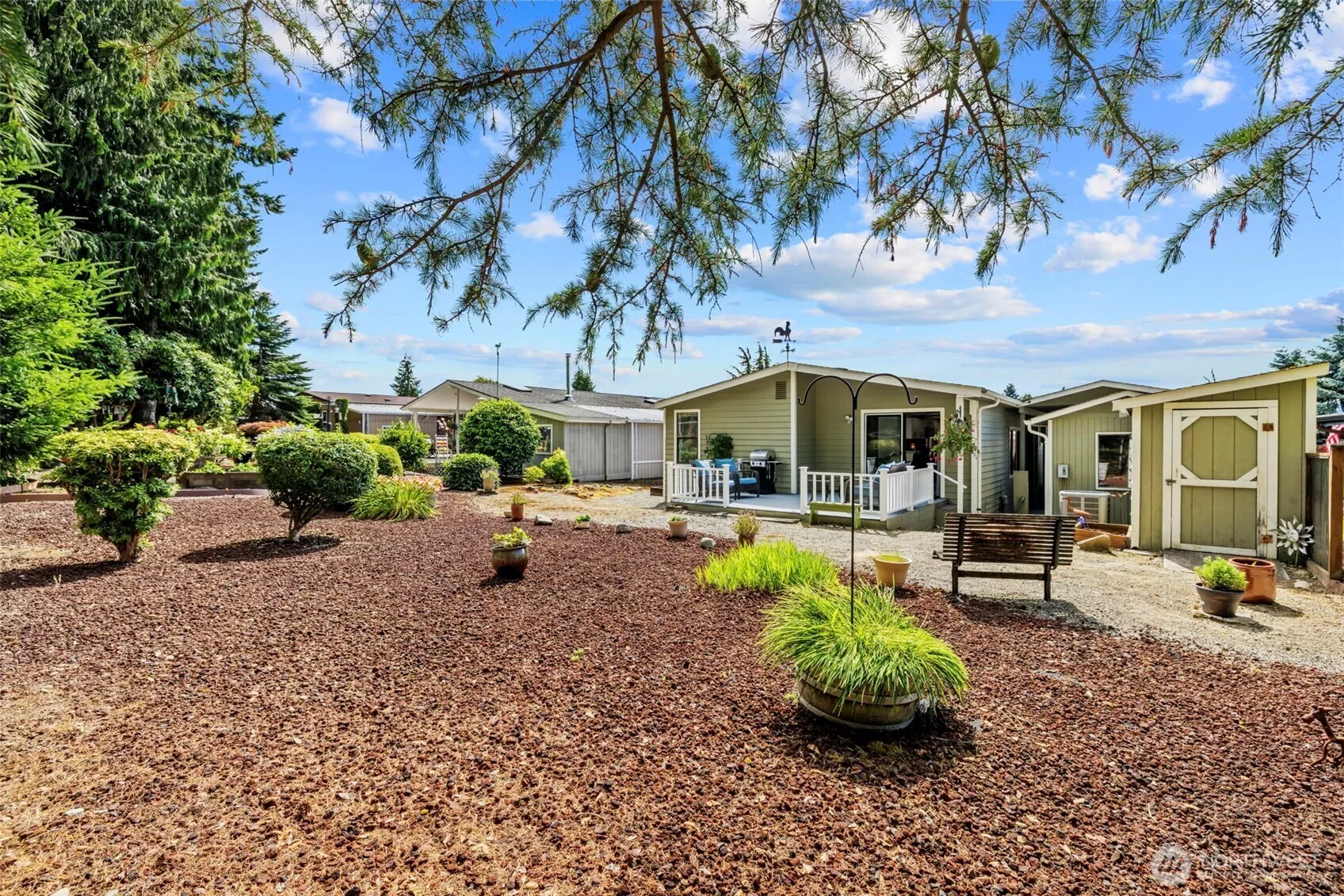 Inviting front porch entrance with patio and side walk up.