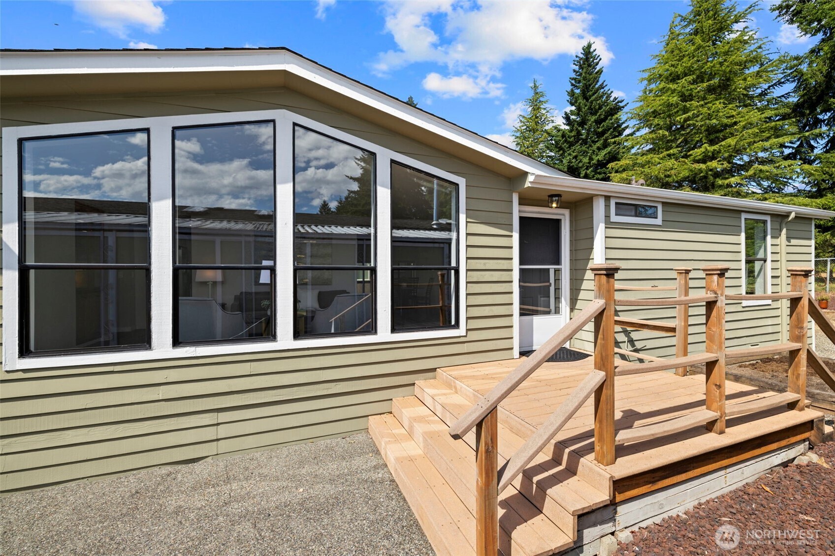 Rare find, overlooking the 3rd tee box at Walter Hall Golf Course. Low maintenance landscape.