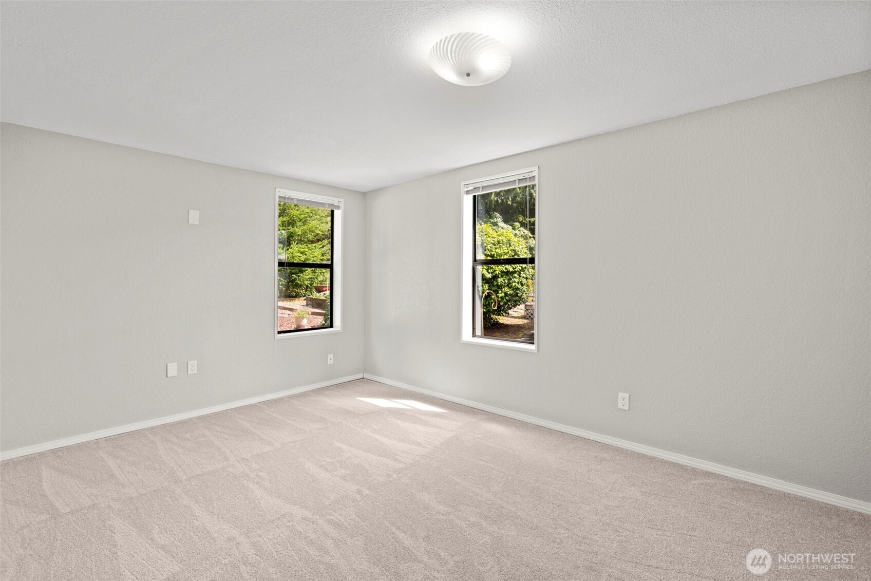 Second bedroom, new carpet and fresh paint.