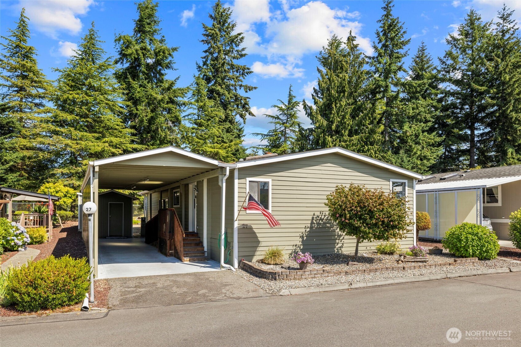 Covered carport parking and storage shed. This is the one!