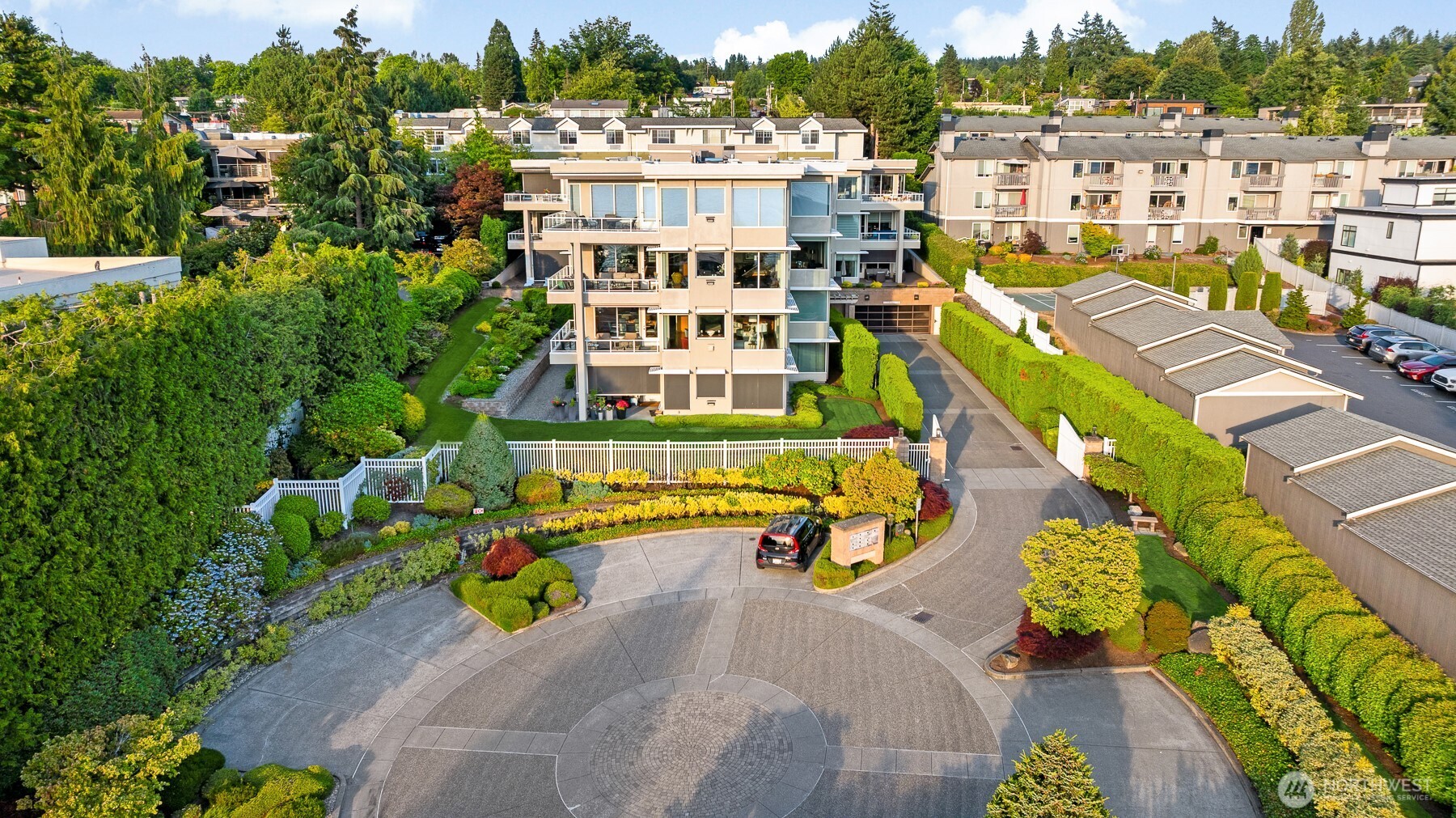 Beautifully landscaped courtyard offers plenty of guest parking