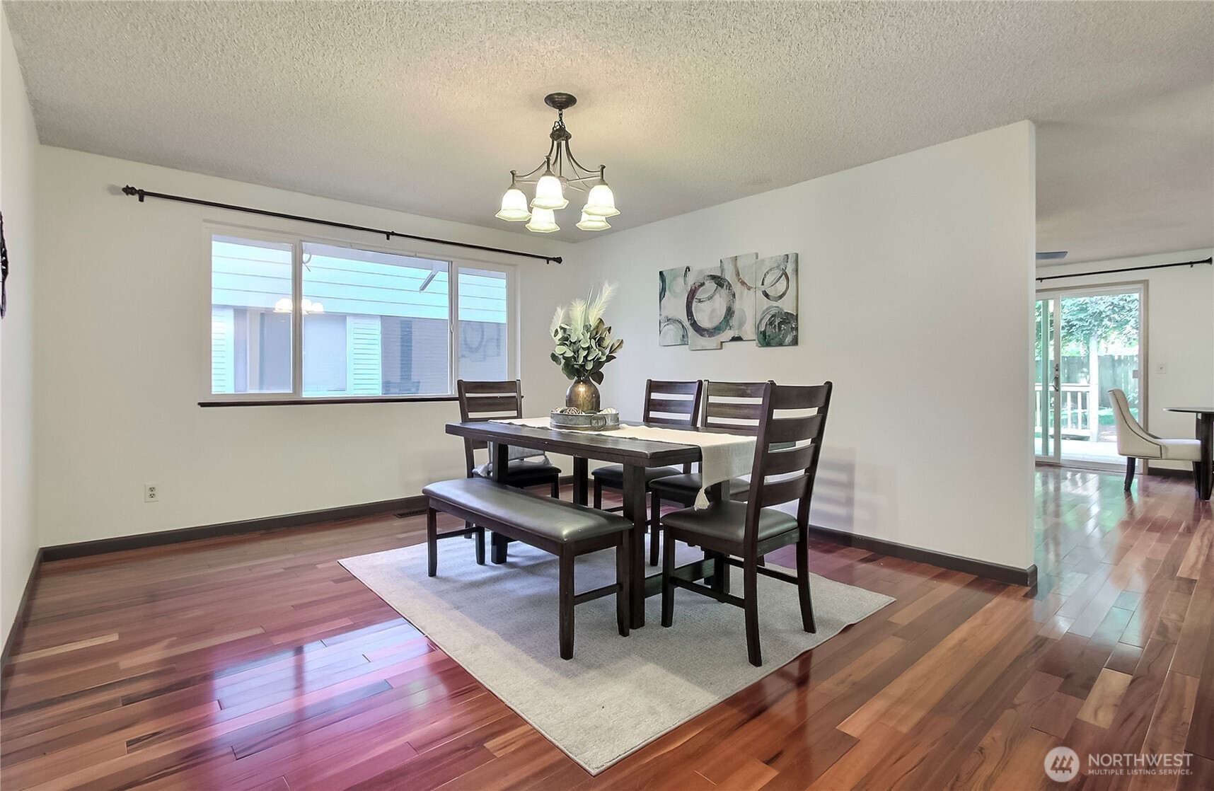 Formal Dining Room. To the right is the family room and sliding door to the back yard.