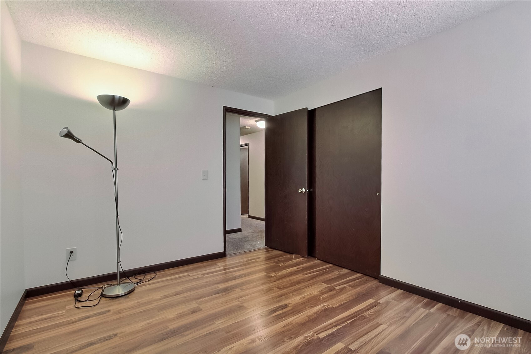 Bedroom #3 with new laminate flooring.