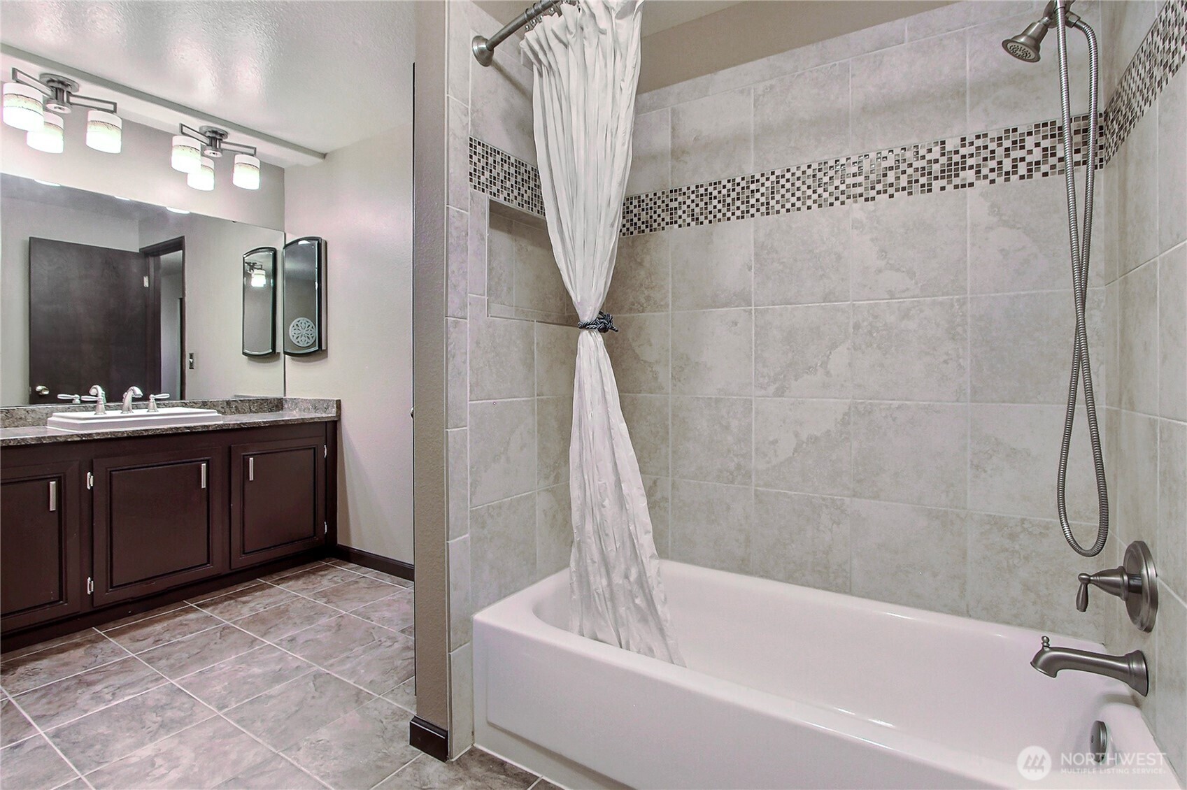 Main bath off hallway has been beautifully remodeled.