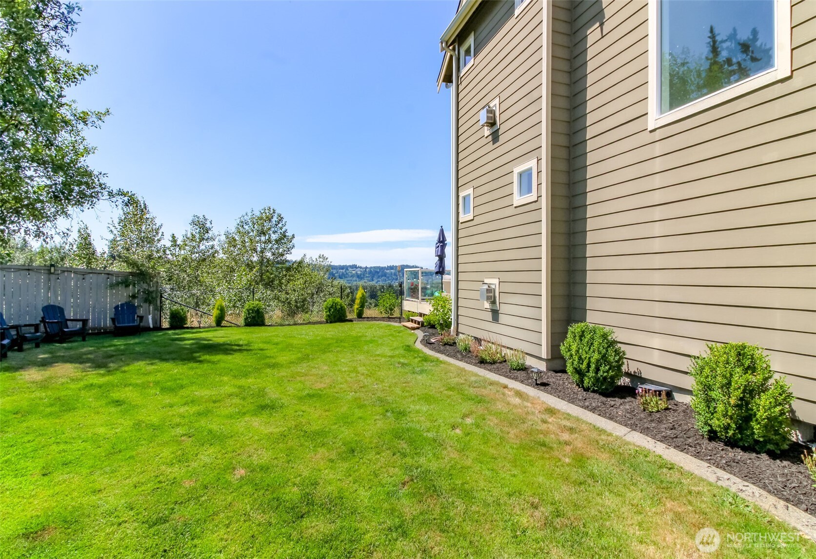 Side yard is fenced and private perfect for outdoor games