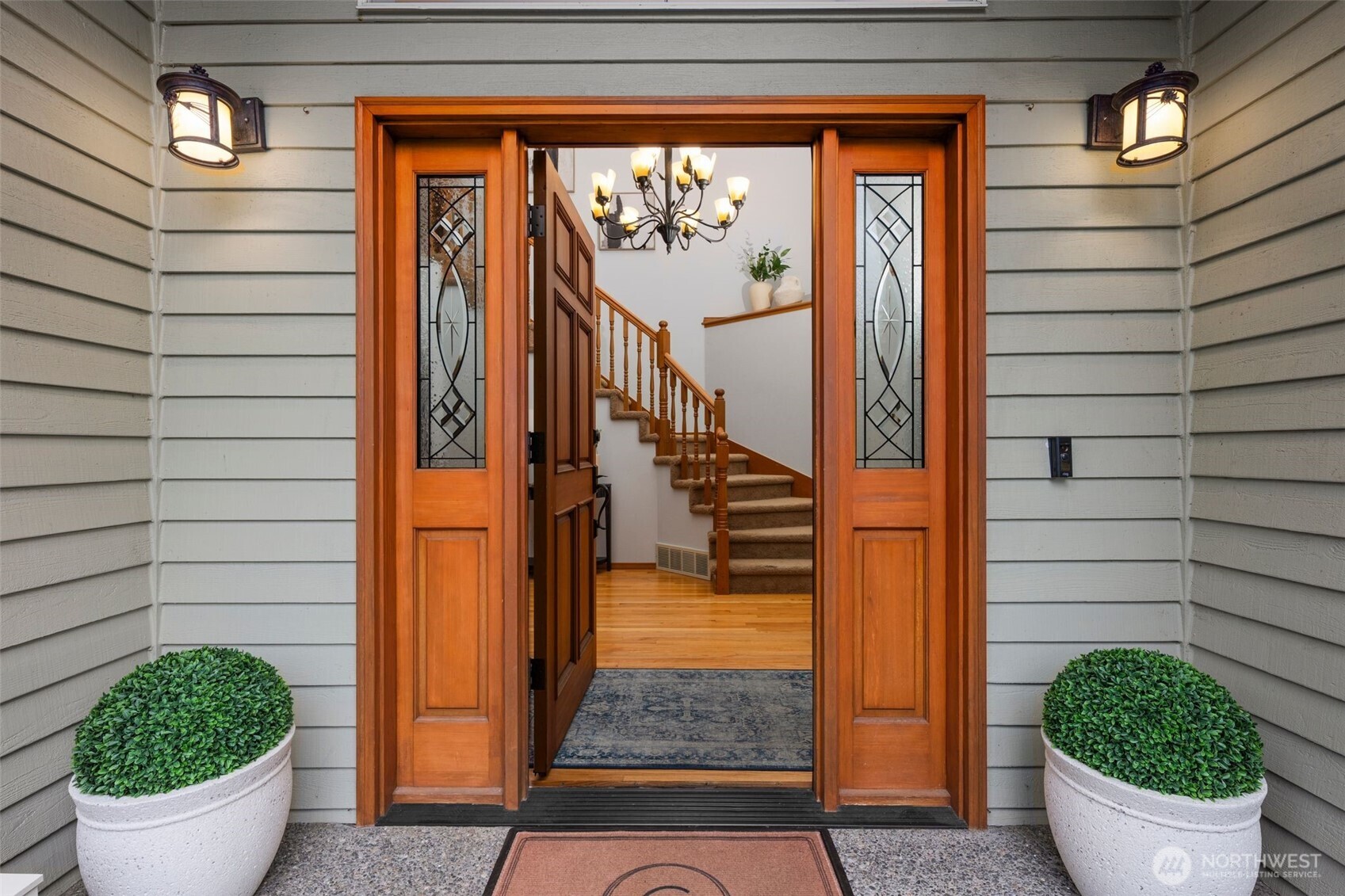Entry door into high ceilings
