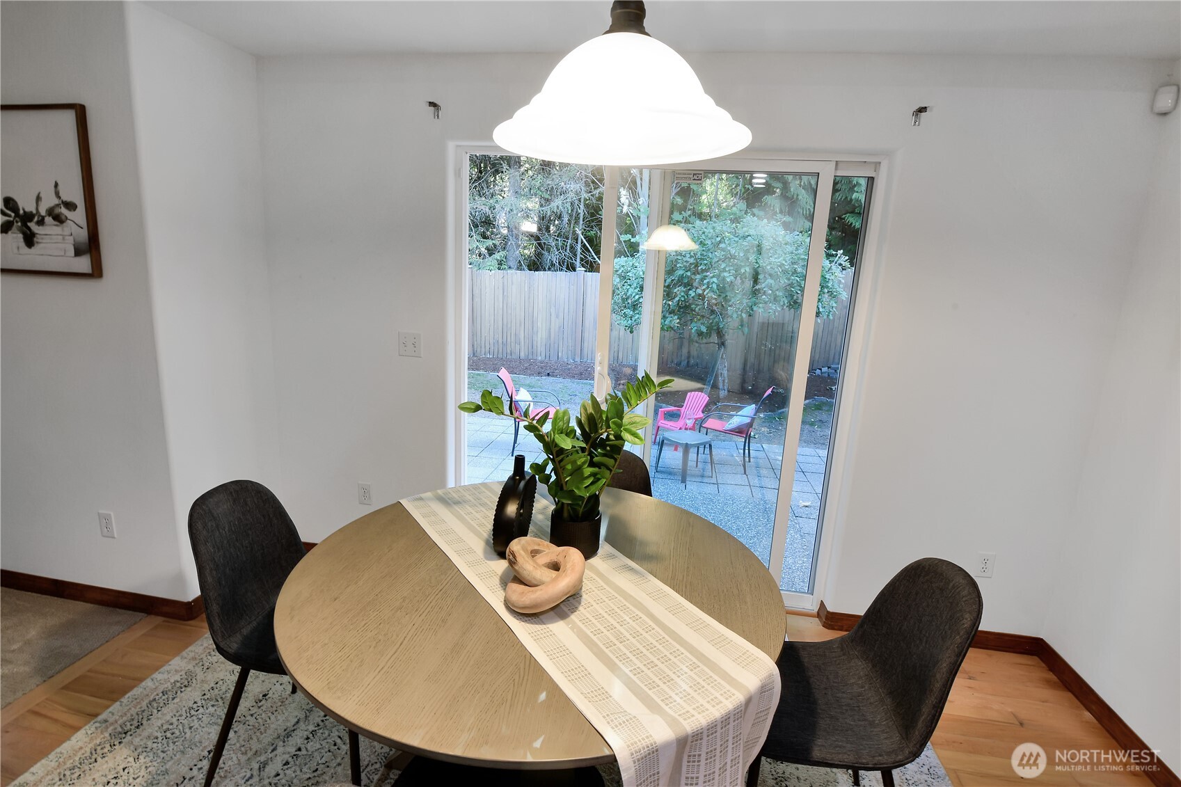 your breakfast nook next to the kitchen is convenient. Step out to the patio and back yard with fruit trees and space for your personal touch.