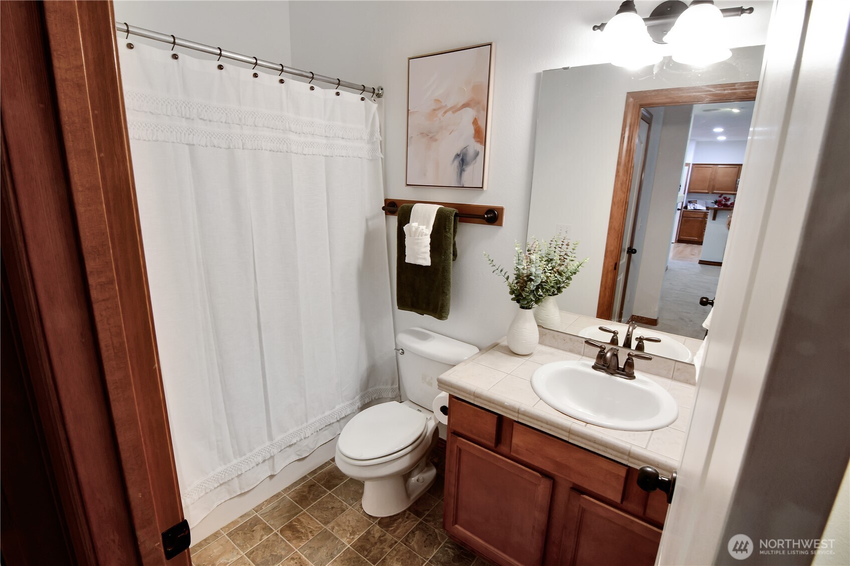 This bathroom is next to the bedroom on the main level