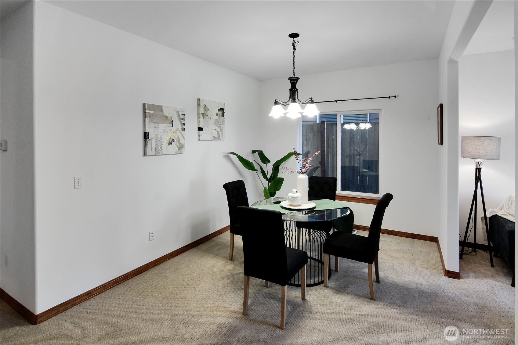 Formal dining room has space for large thanksgiving dinner.