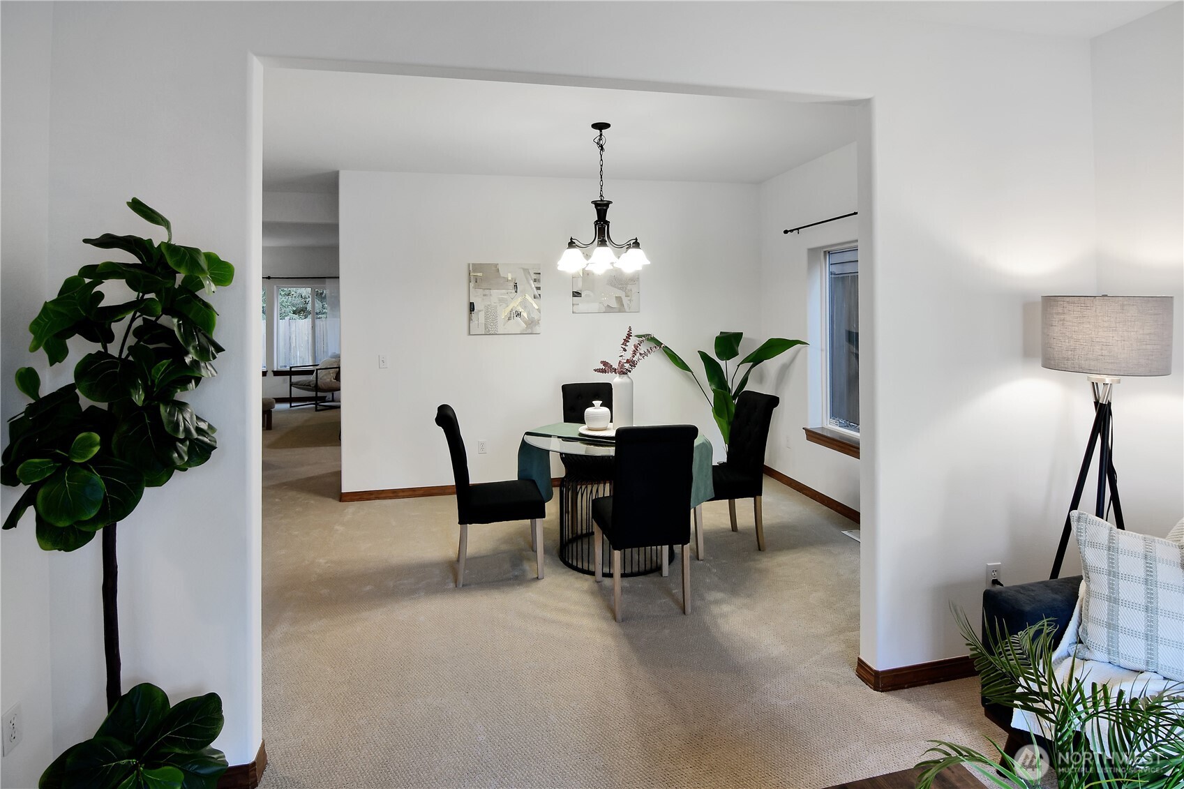 The first living room opens to the dining room and to the kitchen in common sense flow for easy living.