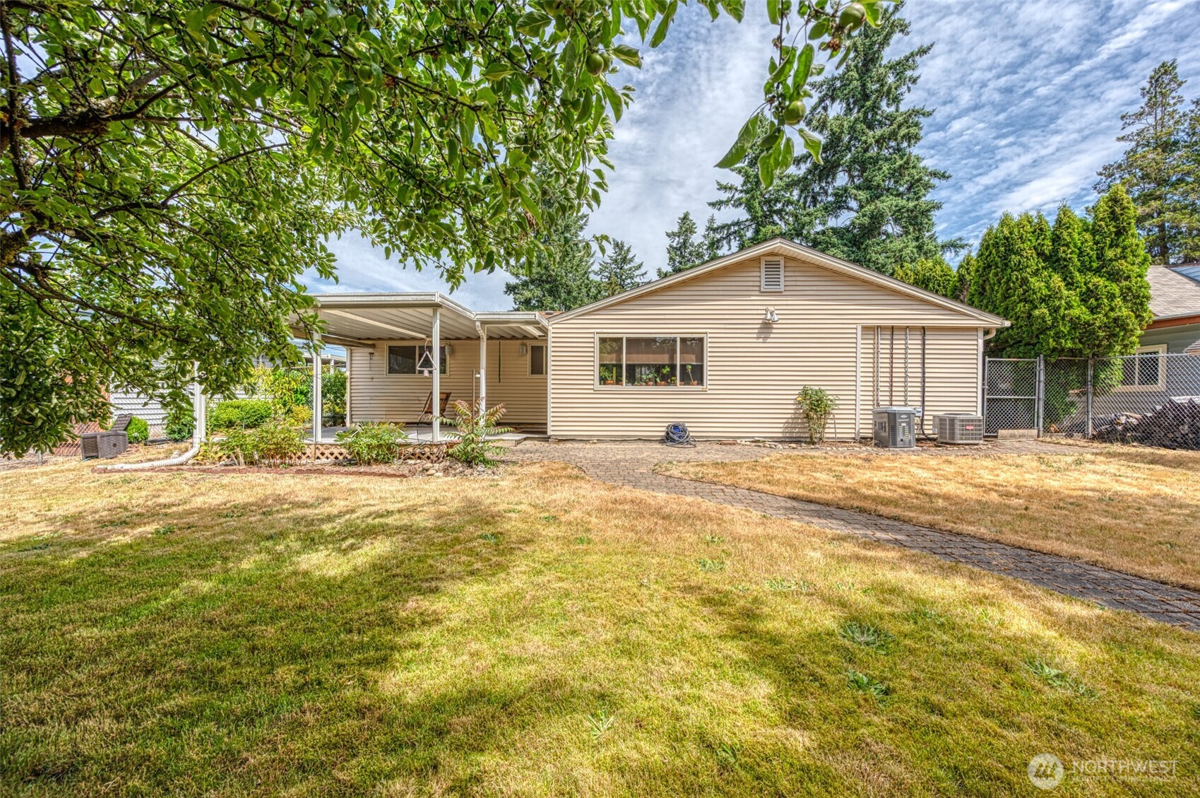 Nice patio area that extends to the outbuildings.