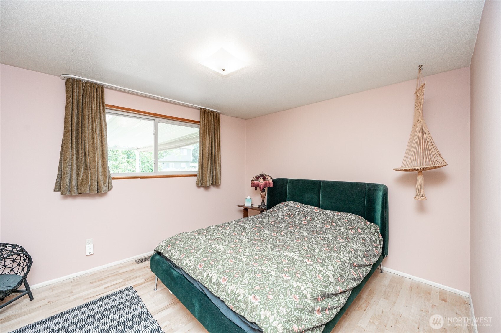 Owner's Suite with hardwoods.  Plenty of natural light comes in.