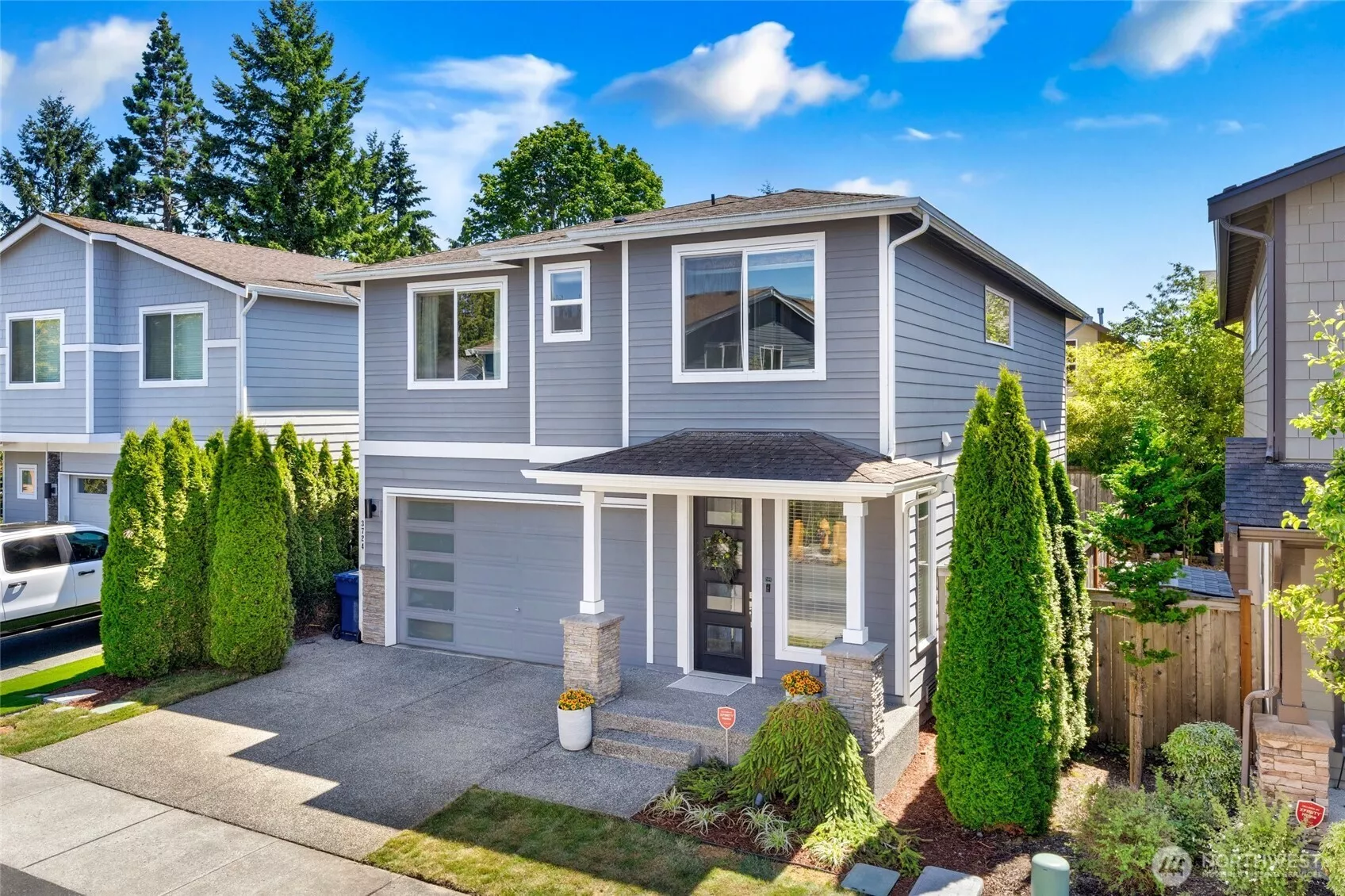Built in 2016, this two-story home features timeless curb appeal with durable Hardie Plank siding and stone-accented columns that frame the covered front porch. The attached two-car garage adds convenience, while the fully fenced yard offers space to play, garden, or relax. Located in a well-maintained neighborhood with a community playground just steps away.