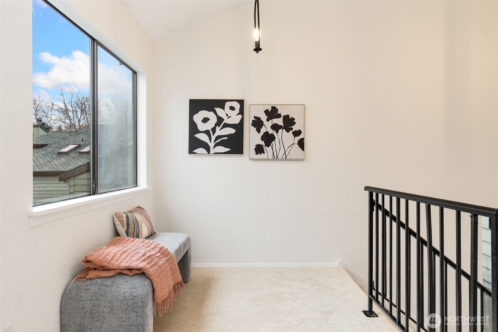 Recent updates feature fresh paint, new carpet and updated light fixtures