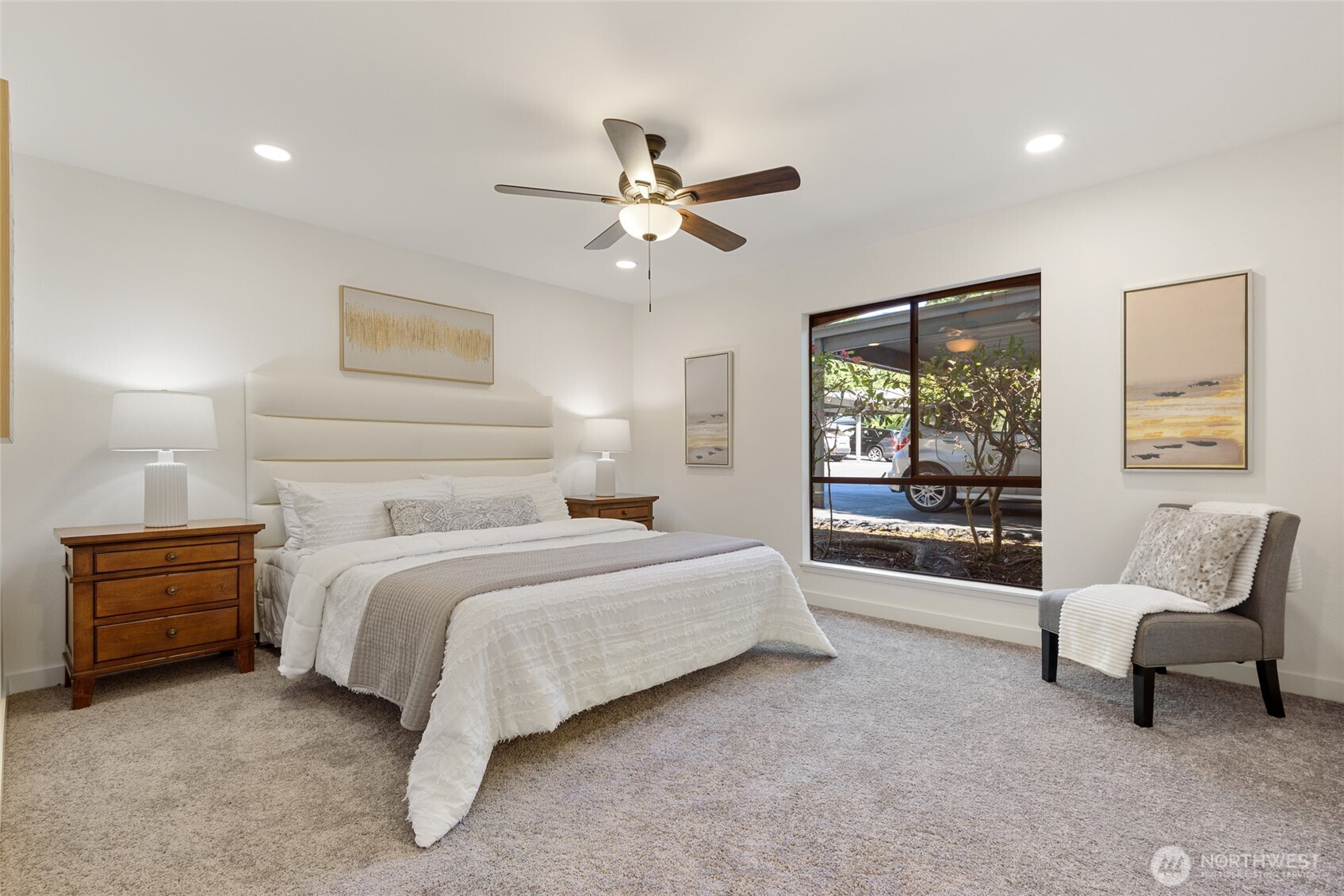 Enjoy this primary bedroom with lots of natural light