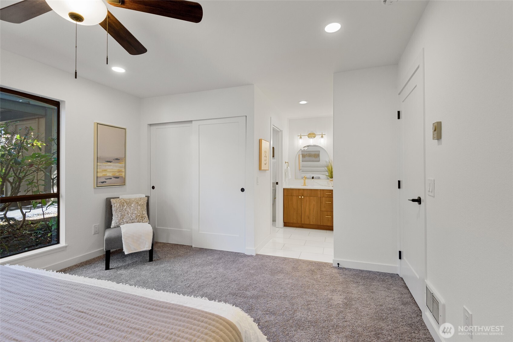 Two closets and attached primary bath