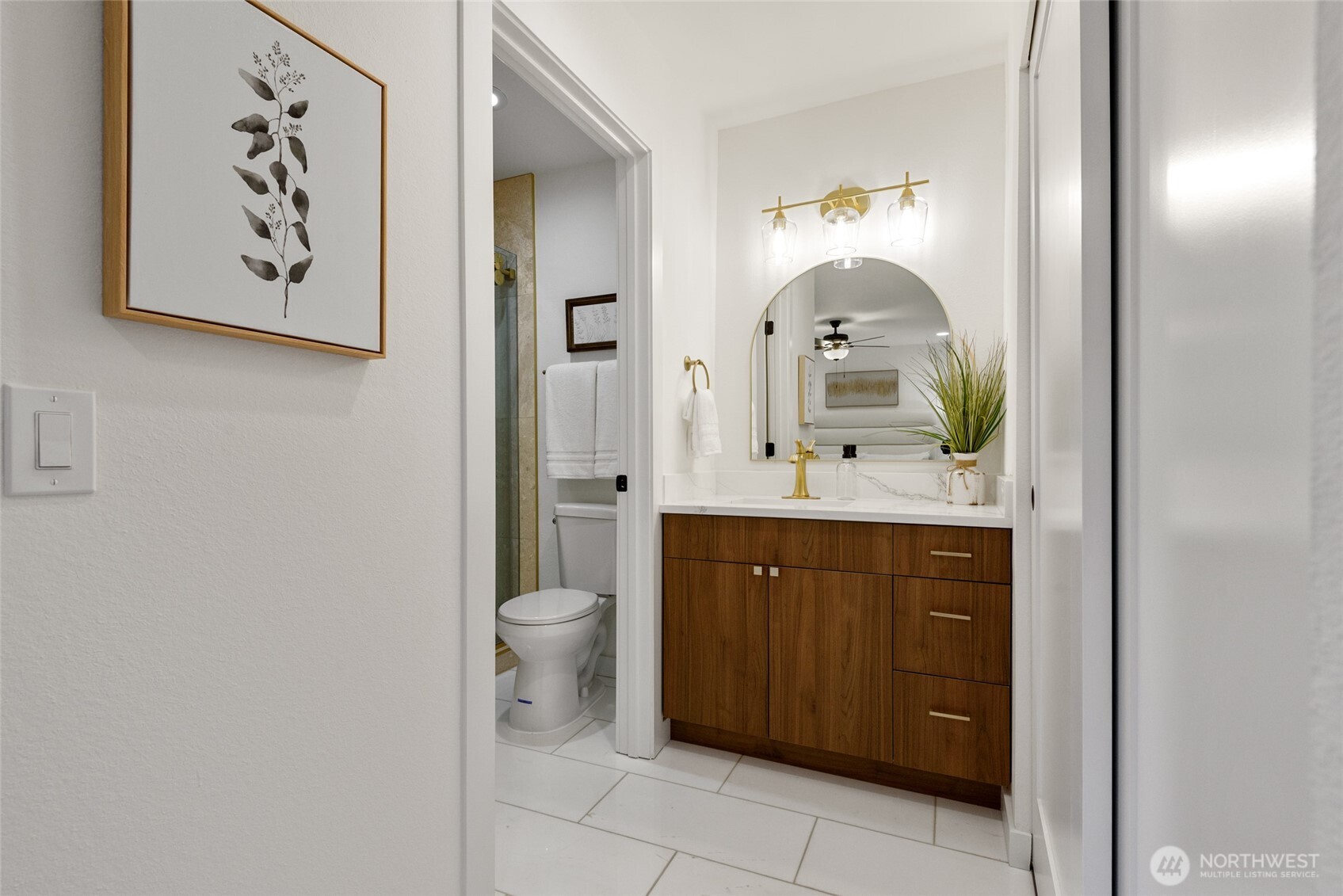 updated primary bath, new tile floors, sink and cabinets