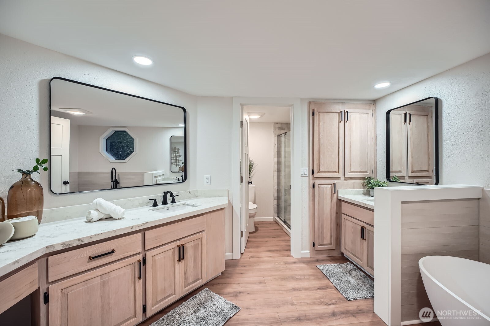 Renovated bath with a freestanding tub