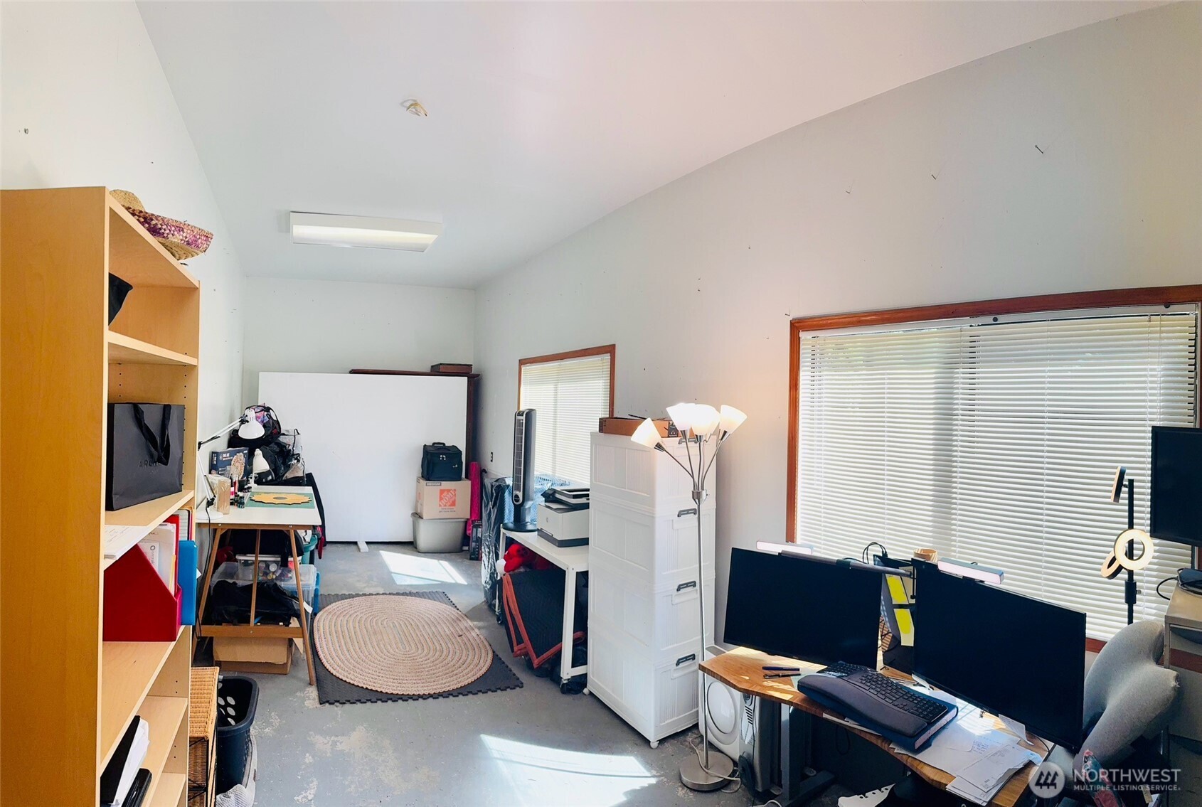 Amazing space in this home office/work space attached to the detached garage.