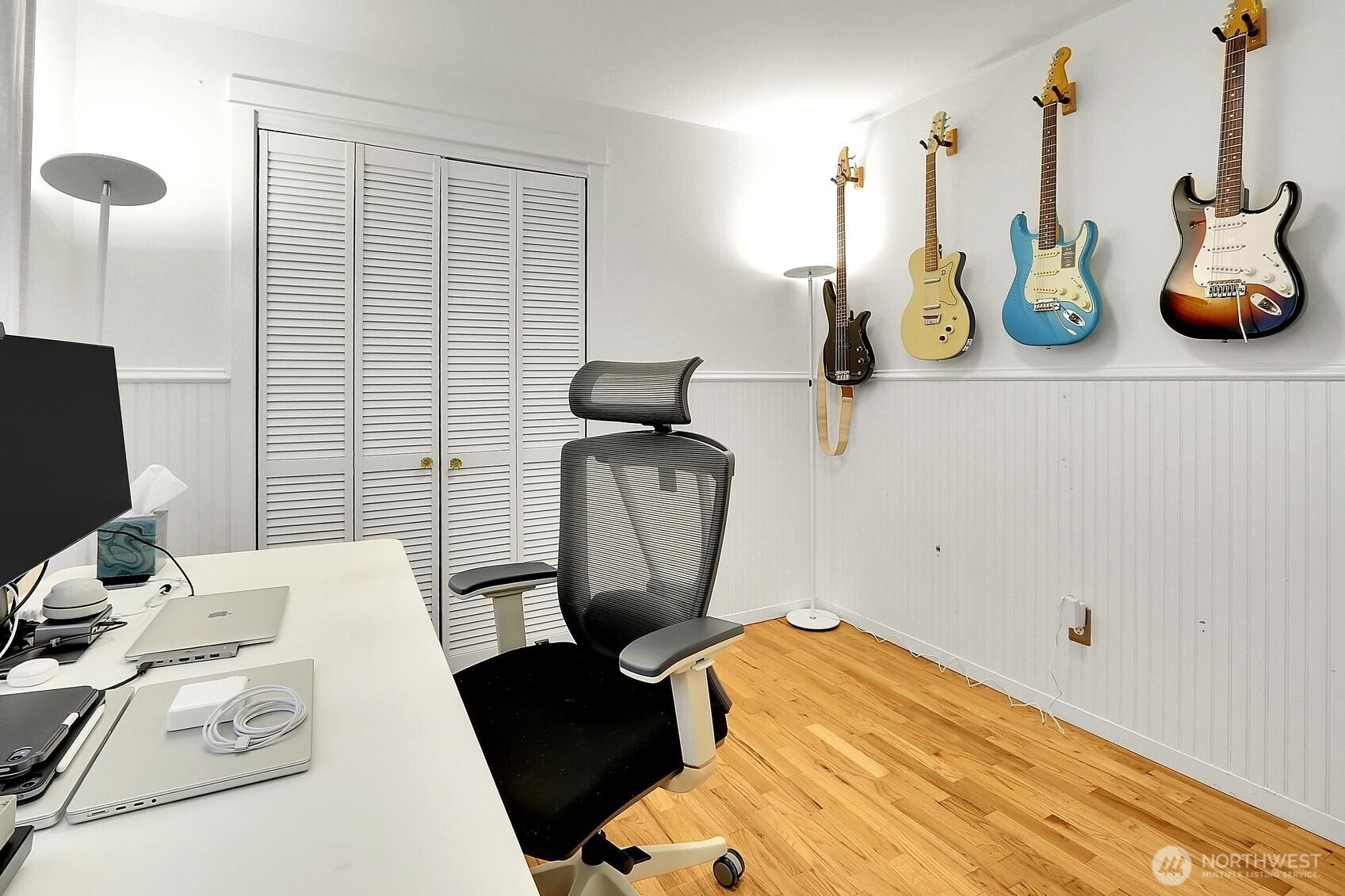 One of the four bedrooms is used as an office.