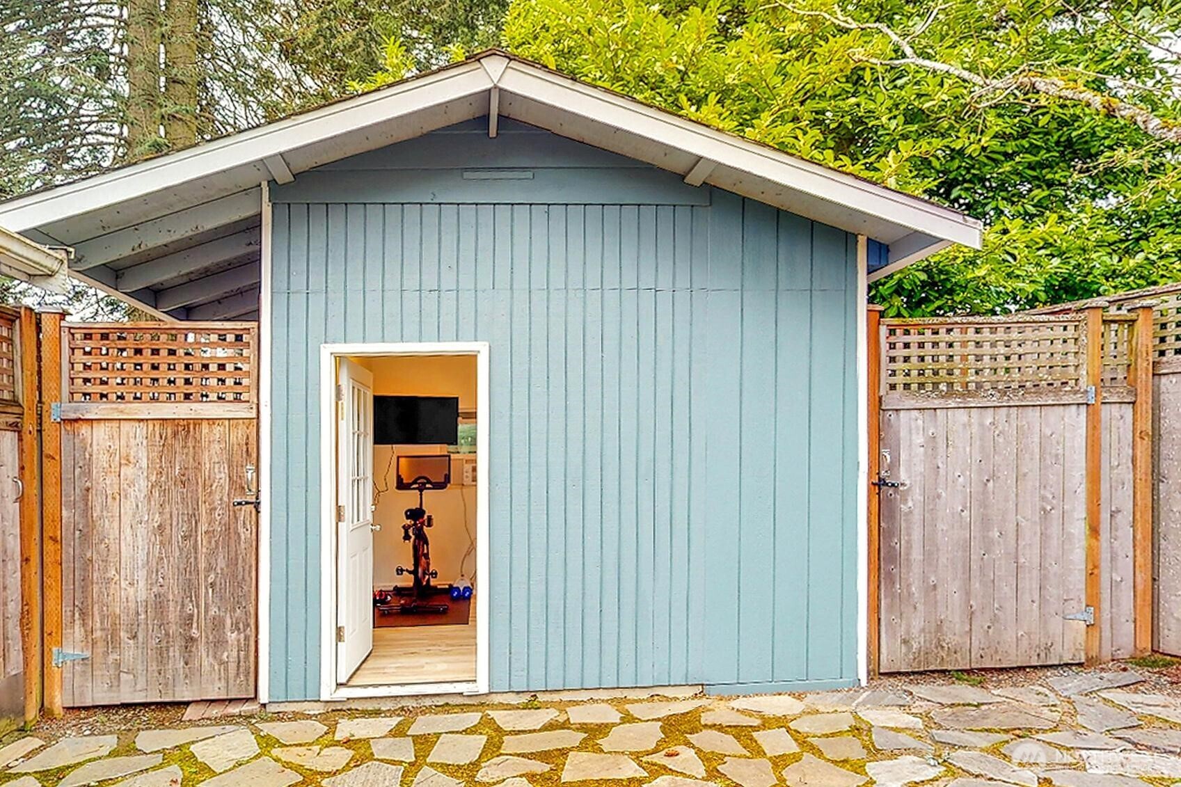 A newly built fully equipped home gym in the backyard.