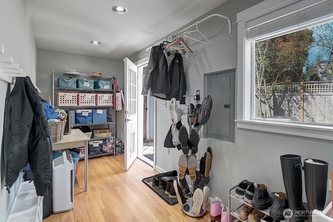 Another angle of the generous storage space in the mud room/utility room.