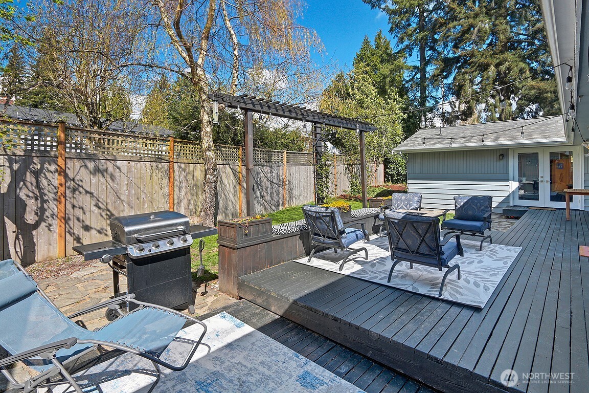 Summer BBQ in this fully fenced level backyard with plenty of privacy.
