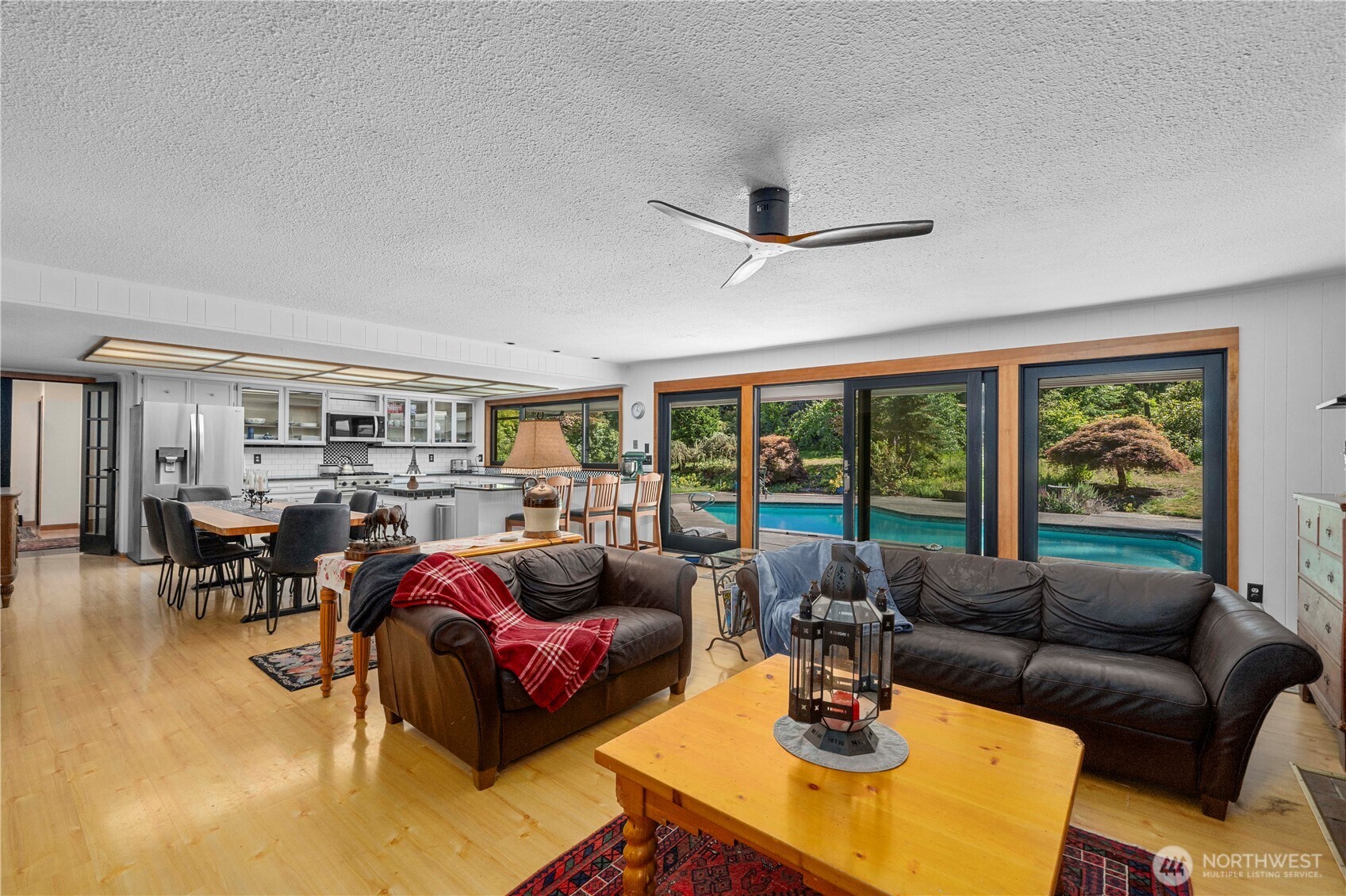 Double doors to the pantry and the single door leads to the lower level