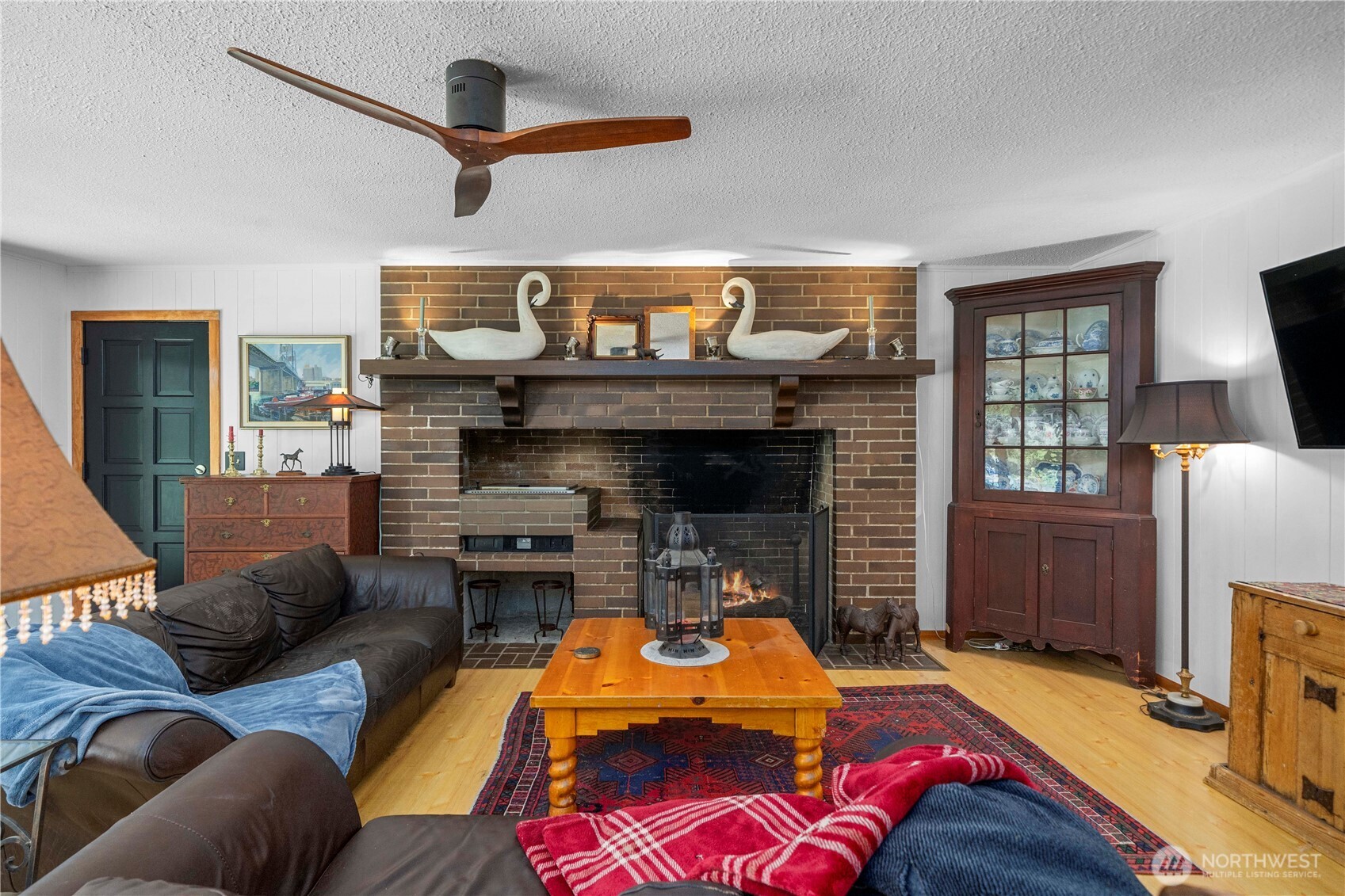 The kitchen features ss appliances, granite counter tops, subway backsplash and an island. It is a wonderful place to cook and entertain in.