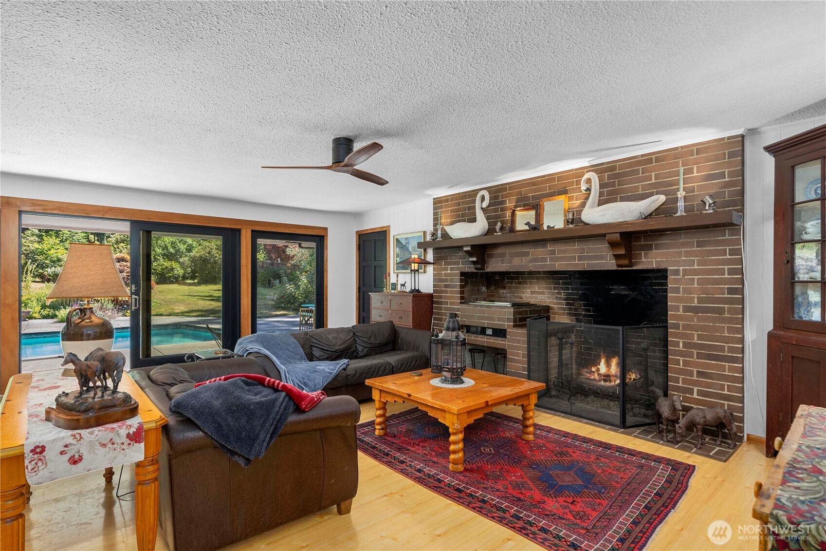 This is the room at the end of the hallway. It could easily become a 3rd bedroom on the main floor