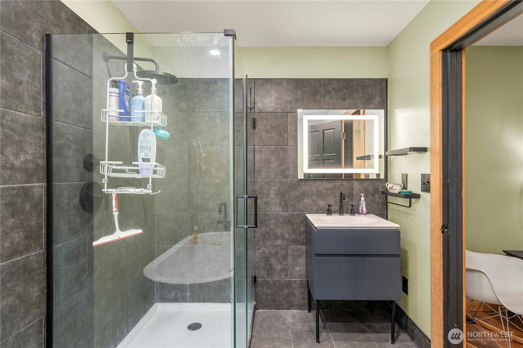 The second primary suite on the main floor.  This is a custom hand scraped floor that is unique.