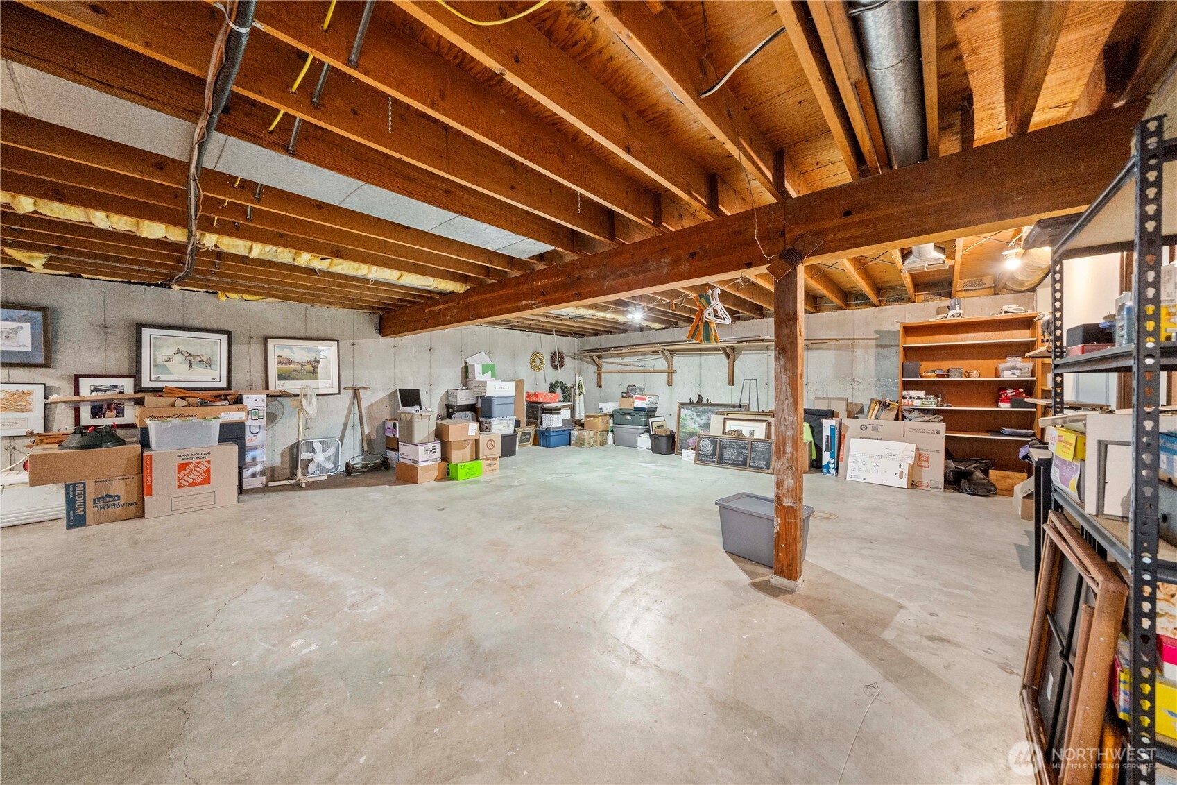 Partially finished lower level reveal the amazing quality of the construction and lumber used when this home was built.