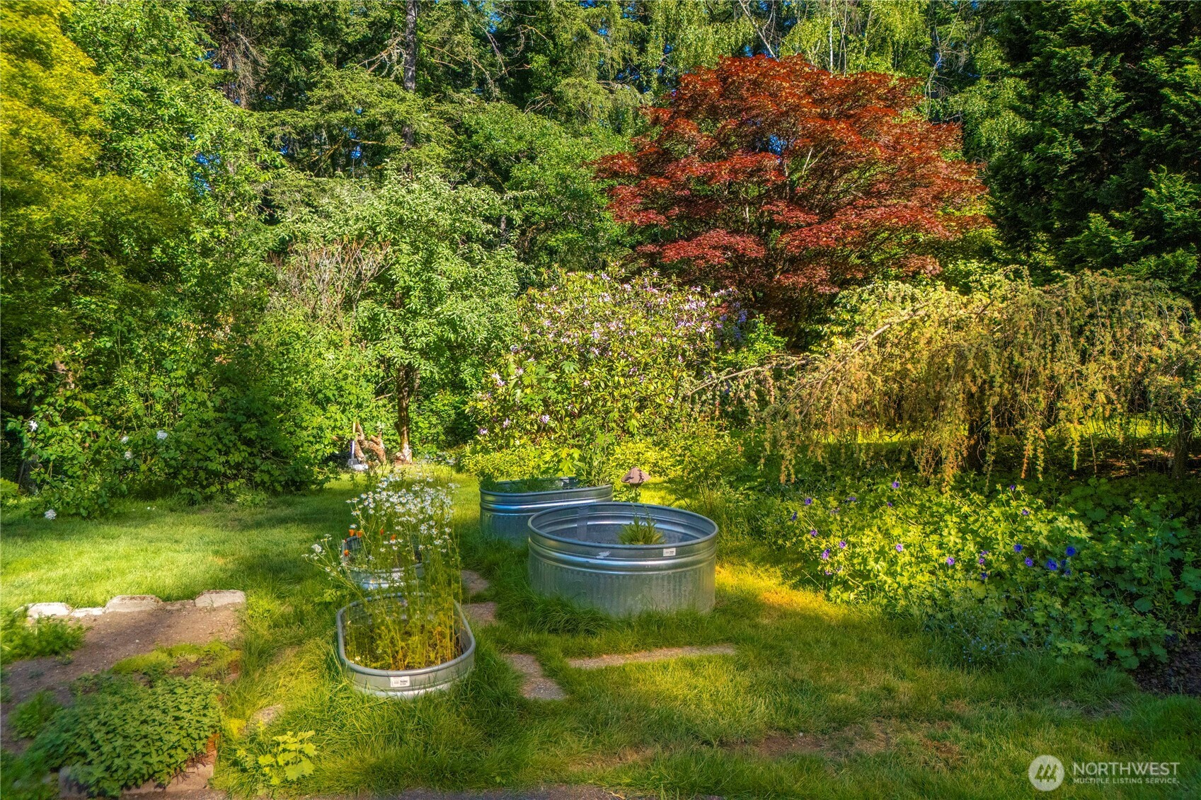 Raised beds await your choice of herbs, spices and vegetables.