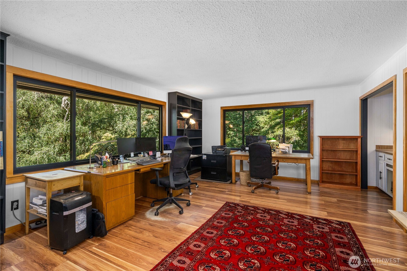 The great room before Great Rooms were fashionable.  This glorious room has new sliders to in-ground pool and your park-like backyard.