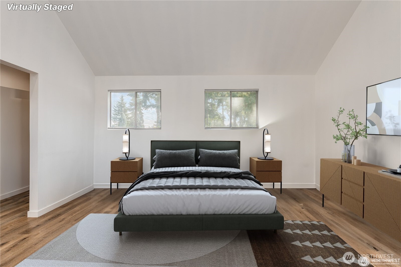 Primary Bedroom Main Home. Photo is Virtually Staged.