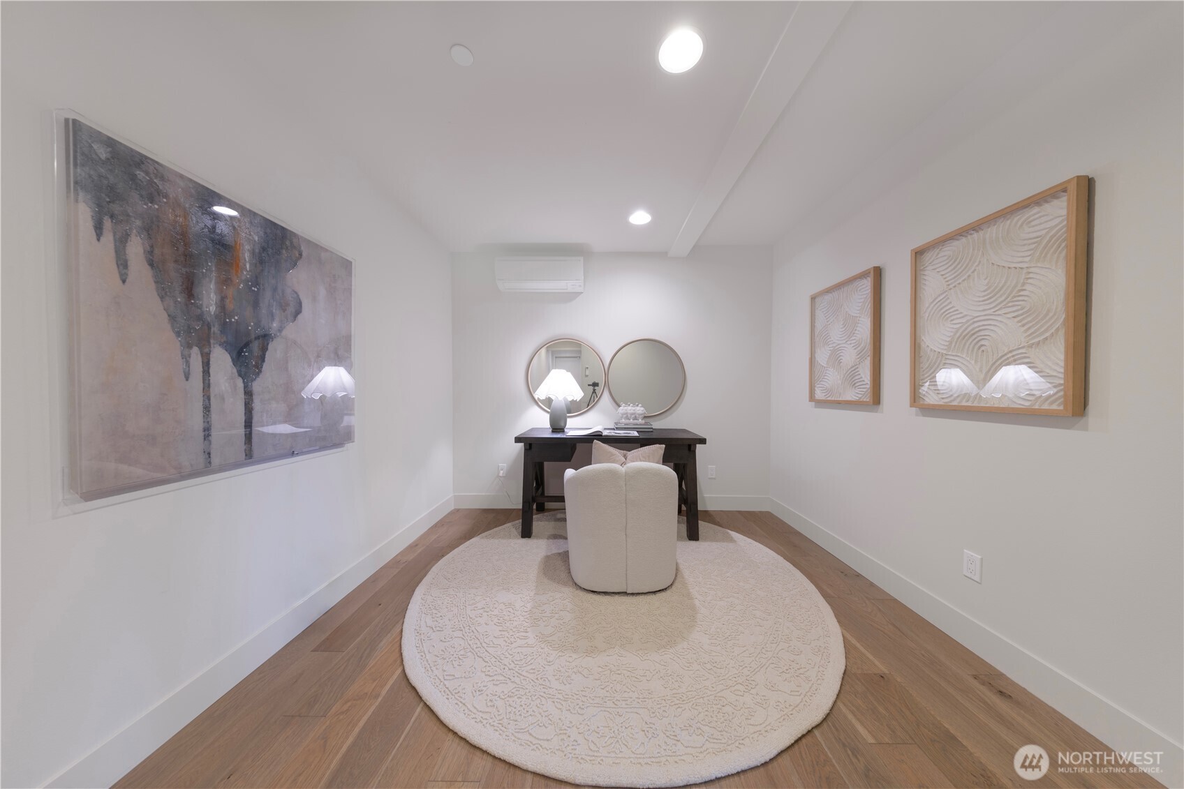 The lower level also includes a generous bonus space, perfect for an office, gym, game room, or extra—flexible to suit your lifestyle needs.