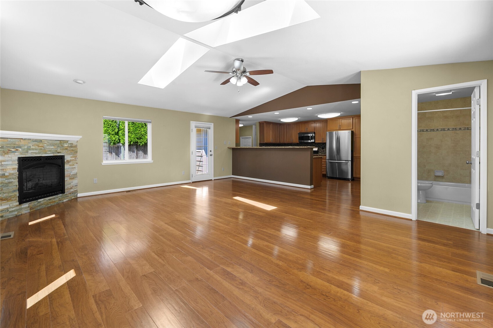 Unstaged view: the great room is bright and inviting, even without furniture.
