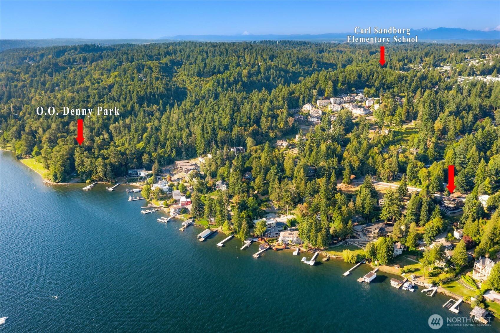 The arrow on the right points to the home. The arrow on the left shows how close the home is to Denny Park Beach. The middle arrow points to popular Carl Sandburg Elementary which is very close to this home.