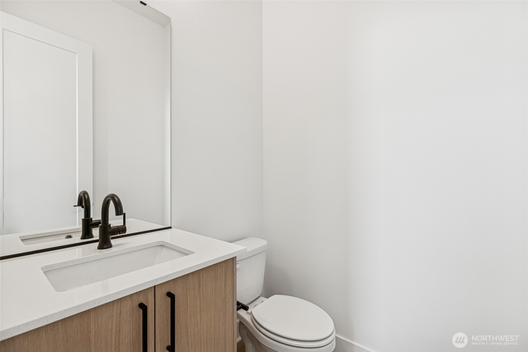 Landing with four  large windows with expansive views of sunsets, territorial and partial downtown.